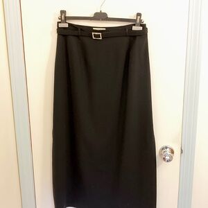 Ann Taylor black evening A-line midi skirt. Size 12P, mid-calf length.